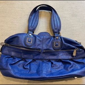 Bright blue BCBG MaxAzria handbag, barely used only 3-4 times. Looks new.